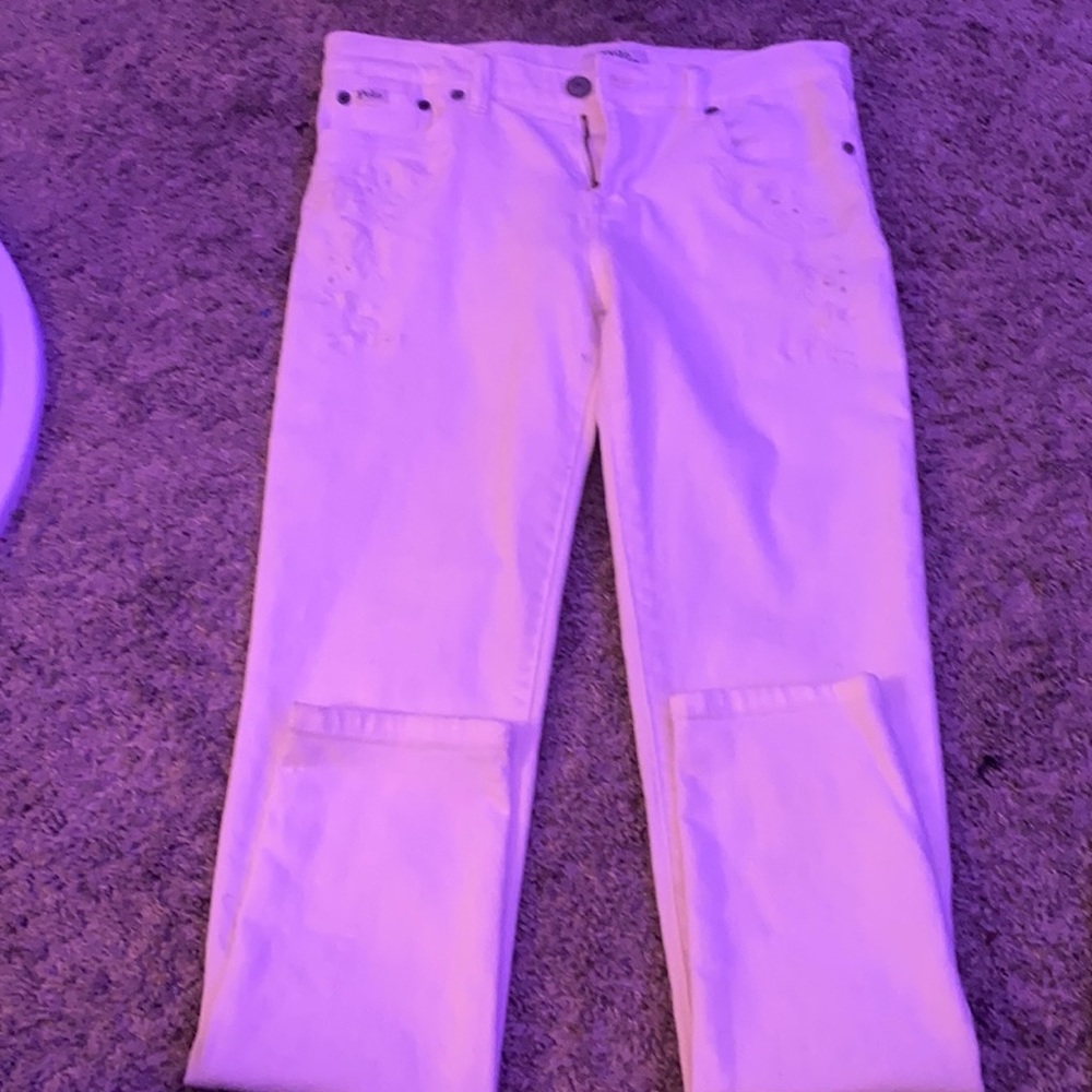 white polo jeans with flowers on the side